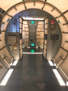 the inside of a sci - fi space station with lights on