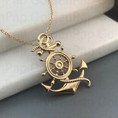 Anchor Shaped Charm Jewelry As Gift, Gold Anchor Jewelry Gift, Gold Nautical Anchor Jewelry, Yellow Gold Nautical Anchor Jewelry, 14k Gold Anchor Shaped Jewelry Gift, Gold Anchor Jewelry For Anniversary, Nautical Anchor Gold Jewelry, Nautical Anchor Shaped Gold Jewelry, Nautical Anchor-shaped Gold Jewelry