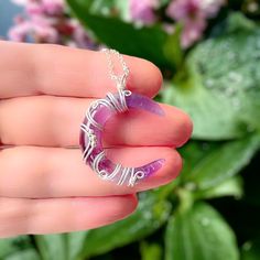 These beautiful moon pendants are wrapped in silver-plated wire with a gemstone in the shape of a crescent moon. There are 5 different gemstone moons available: 1. Amethyst moon 2. Rose quartz moon 3. Rock crystal moon 4. Opalite moon 5. Clear quartz moon MEANING The moon has traditionally been the symbol of the mother Goddess. SIZE The pendant is 3.4cm long and 1.8cm wide. CHAIN For a small, reasonable price you can order a matching silver-plated (see photo) chain in the length of your choice. Moon Amulet, Wire Wrapped Moon, Moon-shaped Amulet Jewelry Gift, Mystical Moon-shaped Metal Necklace, Moon-shaped Sterling Silver Crystal Necklace For Gift, Photo Chain, Moon Necklaces, Spiritual Moon Shaped Nickel-free Necklace, Silver Moon-shaped Amulet Necklace