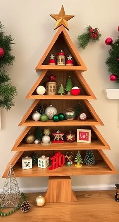 a wooden christmas tree with ornaments on it