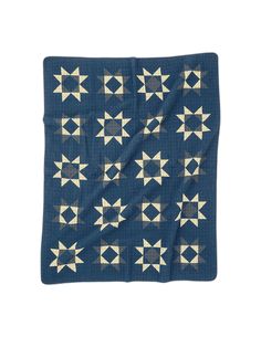 a blue blanket with white stars on it