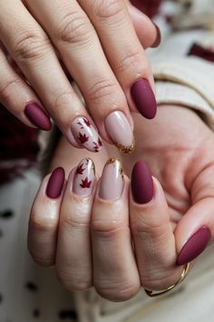 Embrace the beauty of the season with these chic Autumn short nails. Featuring a cozy mix of deep burgundy and shimmering gold accents, this stunning style captures the essence of fall perfectly. The rich colors evoke the changing leaves, making it a perfect choice for any autumn occasion. Transform your look with these delightful fall nail ideas and let your nails shine with seasonal elegance! #FallNailIdeas #AutumnNails #ChicNails #NailArt Short Nails Design Ideas 2024 Autumn, Maroon Autumn Nails, Thanksgiving Nails Burgundy, Autumn Burgundy Nails, Elegant Fall Nail Art, Fall Leaves Nails Design, Fall Nail Designs Leaves, Nail Design Ideas Fall, Autumn Leaves Nail Art