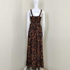 Pattern Type: Allover Print

Sleeve Style: Sleeveless

Neckline: V Neck

Length: Maxi

Material: Polyester, Cotton

Composition: Polyester 85%, Cotton 15% Casual Brown Sleeveless Maxi Dress, Brown A-line Sundress For Summer, Brown Printed Maxi Dress For Summer, Casual Brown Halter Neck Maxi Dress, Sleeveless Printed Brown Maxi Dress, Sleeveless Lined Maxi Dress For Vacation, Brown Sleeveless Printed Maxi Dress, Brown Halter Neck Sundress Maxi Dress, Brown Halter Neck Maxi Sundress