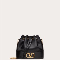 Valentino Garavani Vlogo Signature Mini Bucket Bag In Nappa Leather With Chain Antique Brass-Finish Logo And Hardware - Drawstring Closure And Chain Strap - Chain Drop: 54 Cm / 21.2 In. - Dimensions: W20xh17xd8.5 Cm / W7.8xh6.6xd3.3 In. New Box Included - Made In Italy Modern Evening Bags With Logo, Gold Shoulder Bag With Logo For Evening, Elegant Bags With Logo, Gold Evening Shoulder Bag With Logo, Luxury Logo Shoulder Bag For Evening, Luxury Bucket Shoulder Bag With Logo, Elegant Formal Bags With Logo, Bucket Shoulder Bag With Logo, Gold Evening Bag With Logo