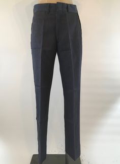 "Fabulous military dress pants/ marching band trousers made of (not sure...guessing) a heavy cotton/nylon twill with cotton banding around and inside the waistline. The black stripes down each leg are made from a heavy corduroy. Metal zipper fly with a flat hook and eye as well as a white glass button keep these trousers shut. Pants are heavy duty and were meant to last. Flat front pants have a watch pocket in the front ant two flat pockets in the back. Waist 38\" Rise 11.5\" Leg Length 30.5\" V Formal Fitted Cotton Bottoms, Fitted Flat Front Cotton Dress Pants, Fitted Cotton Flat Front Dress Pants, Fitted Full-length Cotton Dress Pants, Fitted Cotton Work Pants With Flat Front, Fitted Cotton Bottoms With Flat Front, Semi-formal Wide Leg Cotton Dress Pants, Fitted Cotton Pants For Semi-formal Occasions, Semi-formal Wide-leg Cotton Dress Pants