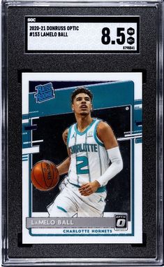 This 2020-21 Donruss Optic card features the highly sought-after LaMelo Ball Rated Rookie RC #153 for the Charlotte Hornets. The card has been graded by SGC to an 8.5 and is a must-have for any basketball card collector. The card is an original and comes from the 2020-21 set of Donruss Optic cards. The card is a standard size sports trading card and has features such as RC, Base Set, and Rookie. It is perfect for fans of NBA and basketball as a sport. The card is not autographed, but it is a rare find nonetheless. Get your hands on this amazing card today and add it to your collection! Lamelo Ball, Team Bags, Charlotte Hornets, Basketball Cards, Sports Collectibles, Hornet, Sports Cards, Collectable Items, Trading Cards