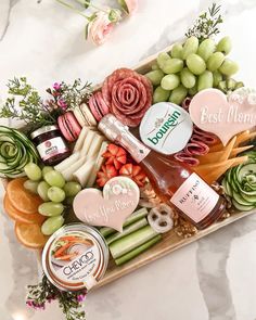 a tray filled with lots of different types of food and condiments on top of a table