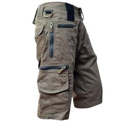 If you're looking for comfortable and practical shorts for your outdoor activities, the Plus Size Zipper Packs Mens Military Cargo Shorts are perfect for you! Made of high-quality materials, these shorts offer great durability and comfort. With their functional design, multiple zipper pockets, and adjustable waistband, these shorts are perfect for all your outdoor adventures, including hiking, camping, and fishing. Available in plus sizes, these shorts are designed to fit all body types, providi Military Cargo Shorts, Cropped Pants Men, Casual Denim Shorts, Short Noir, Army Camouflage, Men Casual Summer, Look Retro, Short Models, Manama