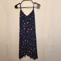 Gap Xs Blue Navy Dress With Colorful Flowers Thin Straps And Cute Details As Pictured Check Out Our Closet To Bundle, And Don't Miss Our Live Shows To See This Item Live Or For Measurements! *Items In Our Closet Not Listed As Nwt Are Previously Loved. Although We Always Try Our Very Best To Disclose Any Seen Blemishes Or Flaws, Smaller Imperfections Might Be Missed. Please Do Not Expect Our Euc Items To Be In Perfect Condition Unless Stated In The Description. We Will Never Sell You Something In Blue Navy Dress, Navy Floral Dress, Gap Dress, Navy Dress, Navy Floral, Navy Blue Dresses, Dresses Xs, Colorful Flowers, Floral Dress