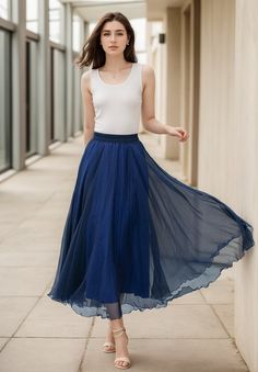 "Blue Chiffon midi Skirt - a must-have for those sunny summer days! This delightful skirt is airy and elegant, perfect for any outdoor occasion. Its flowy design adds a touch of grace to your outfit, making you feel effortlessly chic.  DETAILS: * Chiffon Skirt * Chiffon Lining * No Pockets * High waistband * Around Waist Elastic Closure * Swing skirt * Midi Length Skirt * A-line skirt * Perfect for spring, summer and autumn * Machine Washable in Warm/Cold Water; Do not bleach / Mid-iron / Hang D Luxury Blue Flared Pleated Skirt, Flowy Chiffon Pleated Midi Skirt, Blue Chiffon Beach Skirt, Blue Chiffon Skirt For The Beach, Summer Chiffon Midi Pleated Skirt, Chiffon Pleated Midi Skirt For Summer, Blue Pleated Chiffon Maxi Skirt, Blue Flared Chiffon Skirt, Blue Chiffon Pleated Maxi Skirt