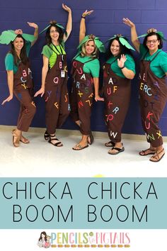 some people are dressed up in costumes and posing for a photo with the words chicka chicka boom boom written on them