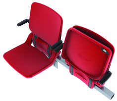 two red seats with black handles are facing each other and one is empty in the middle