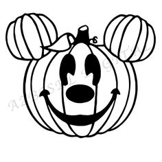 a mickey mouse pumpkin with an evil face drawn on it's front and sides