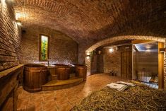 an underground bathroom with stone walls and flooring is pictured in this image from the inside