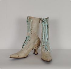 Exciting Edwardian era antique white leather granny boots. Leather uppers and soles, laces have been replaced with fashionable pale blue ribbon, 1910 era, pointed toes, some staining with no color restoration. In solid shape for how old they are but wearability is questionable. Better as an inspiration or collector's piece. **Please- We highly encourage all questions about the items listed.** If the size, color, condition of the item is unclear or you have questions regarding shipping please mes Vintage Lace-up Boots With Pointed Toe And Leather Sole, Vintage Fitted Boots With Laces, Vintage Formal Boots With Laces, Vintage Lace-up Boots For Formal Occasions, Vintage White Lace-up Boots, White Lace-up Vintage Boots, Vintage Cream Boots With Pointed Toe, Vintage Cream Pointed Toe Boots, Fitted Vintage Cream Boots