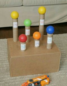 a cardboard box that has some balls in it