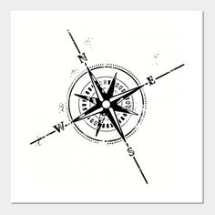 a black and white drawing of a compass