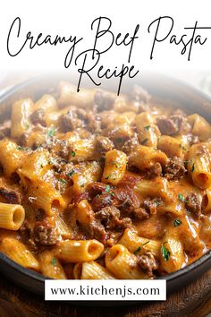 a close up of a plate of food with pasta and meat in it on a wooden table