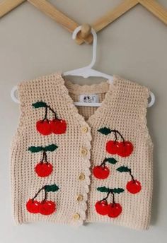 Our Baby/toddler Vest Cardigan is made out of 100% cotton, perfect for keeping your little warm during the winter or autumn months. Add a personalized touch with Embellishments such as flowers 🌺 🌹, cherries 🍒,bows 🎀, polkadots  or a fruit of your choice   To personalize simply state:  1. Embellishment type (eg fruit or bow or flowers etc)  2. Number of Embellishment to add (e.g 3 bows) 3. Location to place Embellishments (back or front OR both) Please feel free to message me if you have any Cute Knitted Cotton Cardigan, Casual Knitted Cotton Patterns, Casual Cotton Knitted Patterns, Fitted Embroidered Cotton Cardigan, Cute Embroidered Cotton Cardigan, Handmade White Cotton Patterns, Hand Knitted Cotton Top For Fall, Handmade Cotton Sweater For Spring, Fitted Hand Knitted Cotton Sweater