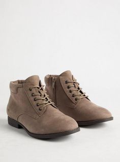 Opt for comfort and style with our faux suede boots that have a lace-up front and a side zipper. Our unique fit gives you extra wide width and extra room around your whole foot. EXTRA WIDE WIDTH (WW). Lace-up front. Side zipper. Almond toe. 1” heel. Extra cushioned footbed; textured outsole. Man-made material. Imported wide width shoes. The best plus size women's lace-up bootie (ww) booties in dark taupe made of pleather. Rock your look from Torrid to Festivals like Coachella and Lollapalooza, a concert, a show, or just for fun! Torrid is your destination for cozy fall and winter clothes to keep you warm and comfortable. Trendy Medium Width Lace-up Faux Leather Boots, Brown Lace-up Boots With Wide Calf And Round Toe, Trendy Lace-up Booties Medium Width, Leather Lace-up Booties Of Medium Width, Brown Lace-up Medium Width Booties, Women's Lace Up Boots, Black Lace Up Boots, Faux Suede Boots, Unique Fits