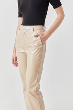 Our faux leather pants from Grey Lab feature a slightly shiny fabric with a soft fleece-like lining. The high-waisted silhouette pairs well with your favorite cropped sweatshirt for a casual yet put-together look. Shiny faux leather fabric Zipper fly with hook-and-bar closure Slash pockets Back pockets Belt loops High waisted Hand wash cold Do not bleach Do not tumble dry Do not Iron Do not dry clean Shell: 100% Polyester Coating: 100% Polyurethane Contrast: 95% Polyester 5% Spandex Lining: 100% Trendy Solid Color Polyurethane Pants, High-waisted Leather Pants For Fall, Trendy Workwear Pants In Polyurethane, Fall High-waisted Leather Pants, Chic High Waist Polyurethane Leather Pants, Chic High Waist Faux Leather Pants, Chic Polyurethane Leather Pants For Winter, Trendy Leather Pants For Work, Chic Winter Leather Pants