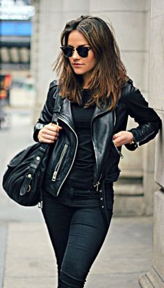 Elevate your outerwear collection with this women's slim-fit black biker-style jacket, expertly crafted from lightweight sheep leather. This jacket combines edgy style with a flattering silhouette, hugging your curves while providing the freedom to move. The soft, supple leather offers a luxurious feel, ensuring comfort without sacrificing style. Featuring classic biker details such as zippered pockets, an asymmetrical front closure, and subtle stitching accents, this jacket brings a modern twist to a timeless design. The sleek black finish makes it a versatile staple, easily pairing with everything from distressed jeans to flowy dresses. Perfect for layering or making a statement on its own, this lightweight jacket is ideal for transitional weather. Embrace your inner rebel and enhance yo Stil Rock, Outfit Trabajo, Mode Tips, Walking Down The Street, Pastel Outfit, Blazer Outfit, Jackets Women, Leather Jacket Outfits, Mode Casual