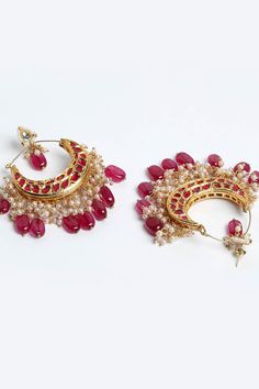 Product Features: Color: Red, White, Gold Base Metal: Sterling Silver Work: Kundan, Pearls, Natural Stones, Faux Ruby Plating Material: Gold Plated Closure Type: Stopper Adjustable: No Earring Size: Length 8.5 CM x Width 6.5 CM Package Content: 1 Pair Earring Occasion: Partywear Disclaimer: There will be slight difference in digital to actual image Kundan Chandbali, Chandbali Earrings, Silver Work, Base Metal, Product Features, Natural Stones, Red White, Ruby, Gold Plate