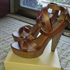 New With Tags. Size 8 Heals/Sandals Wooden Platform Sandals With Open Heel, Brown High Heel T-strap Sandals For Summer, Brown Non-slip Synthetic Sandals, Brown High-heel Wedge Sandals With Heel Strap, Wooden Platform Sandals, Gold Flat Sandals, Cognac Sandals, Silver Flip Flops, Feather Sandals