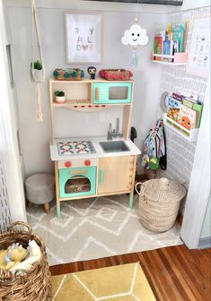 Kids closet turned into minimalistic play area and Reading area Closet Toy Room, Closet To Play Area, Playroom Closet Ideas Play Areas, Hallway Play Area, Closet Into Play Space, Closet Play Nook, Turn Closet Into Play Area, Playroom Closet Ideas, Kids Closet Play Space