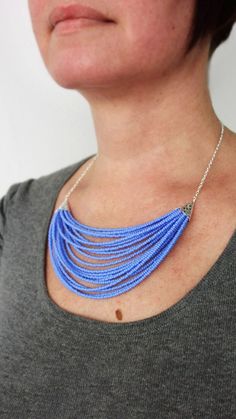 Statement Necklace Layered Blue Seed Beads Bib Multi-strand Blue Spacer Beads, Blue Multi-strand Spacer Beads, Multi-strand Blue Beads For Jewelry Making, Blue Multi-strand Beads For Jewelry Making, Blue Multi-strand Necklace With Tiny Beads, Blue Multi-strand Beaded Chain, Blue Multi-strand Necklace With Spacer Beads, Blue Multi-strand Beaded Necklace, Blue Multi-strand Faceted Beads