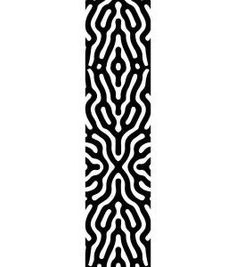 a black and white pattern on the side of a tall pillar with an intricate design