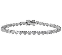 Adorn your wrist with the elegance of this tennis bracelet showcasing a delicate heart design with diamonds that serve as sparkling accents. This exquisite piece, plated in rhodium for added shine, features a secure box clasp ensuring it stays in place as you move through your day. From the moment you slip it on, this bracelet becomes a symbol of love and luxury that complements any outfit. Heart Line, Fitness Jewelry, Koolaburra By Ugg, Italian Jewelry, Box Clasp, American Leather, Love Symbols, Tennis Bracelet, Diamond Heart