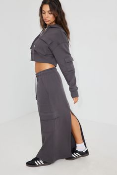 Okay but the sweat skirt though? I'm- Features - Drawstring at elasticized waistband - Side cargo pockets - Central slit at back hem - Fleece lining Size & Fit - Rise: Mid-rise - Length: Maxi - Model is wearing size S Materials & Care - Content: 65% cotton, 35% polyester - Care: Machine wash, cold - Imported Garage Clothing, Cargo Skirt, Next Clothes, Gray Skirt, Bottom Clothes, Grey Hoodie, Skirt Outfits, Bottoms Pants, Maxi Skirt