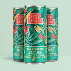 three cans of long island drinks on a green background with birds and flowers in the leaves