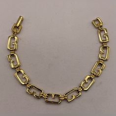 Gorgeous Vintage Signed Givenchy Gold Tone Logo G's Chain Link Statement Bracelet 7 1/2”. Very Little Signs Of Wear. No Color Loss. In Beautiful Vintage Condition. Disclaimer- Please Keep In Mind When Purchasing Vintage / Pre-Loved Items There May Be Some Signs Of Age And Wear As These Items Are At Least 20 Years Old. I Do My Best To Fully Explain The Condition Of Every Item And Disclose Any Specific Issues As Well As I Can. Please Feel Free To Ask If You Have Any Additional Questions About An Item. Vintage Vtg Coquette Balletcore Cottagecore Beaded Jewelry Hippy Retro Mod Modern Boho Bohemian 40s 50s 60s 70s Accessory 80s 90s Y2k Necklace Multistrand Gem Crystal Choker Bracelet Art De Designer Gold Metal Chain Bracelet, Designer Gold Chain Bracelet, Designer Gold Chain Bracelet For Formal Events, Vintage Givenchy Jewelry, 70s Accessories, Bracelet Art, Y2k Necklace, Crystal Choker, Statement Bracelet