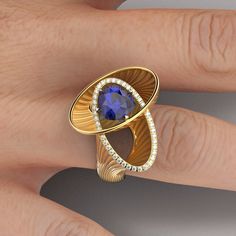 Tanzanite and diamond ring made in Italy available in 18k, statement gold ring. Italian fine jewelry, large ring with organic gold shape  A beautifully well-crafted elegant ring with natural Tanzanite and natural Diamonds. A solid gold ring with a combination of raw and polished finishes. Made in solid Gold this statement ring is coming in  18k yellow gold,  18k rose gold and 18k white gold ❥ Details Main stone: Natural Tanzanite from Tanzania Weight: 2.71 Ct Measurements: 8,9 x 8,9 x 5,6 mm Stone Type: 100% Natural Diamonds Shape: Round Brilliant Carat Weight: approx 0,26 Cts TW Color: G Clarity: vs Cut: Excellent Sizes available: choose your size from the drop down menu ★ ★ ★ ★ ★ ★ ★ ★ ★ https://www.etsy.com/shop/OltremareGioielli ★ ★ ★ ★ ★ ★ ★ ★ ★ ❥ Procedure information If you need a c Statement Gold Ring, Tanzanite And Diamond Ring, Tanzanite Diamond Ring, Gold Statement Ring, Jewels Rings, Tanzanite Ring, Solid Gold Ring, Fancy Diamonds, 18k Gold Ring