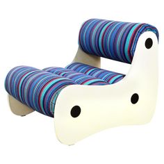 a white and blue striped chair with black dots on the bottom part, sitting in front of a white background