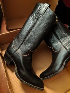 Vintage 1975 Tony Lama Black Buffalo Boots.  These have never been worn.  I found them in my Grandparent's attic and they were meant for my Uncle for Christmas in 1975 but he died in a motorcycle accident before they could give them to him.  Original box, stickers, instructions, etc.   Per a helpful contact: "Size "465" means men's size 6-1/2 D. The way the code works is, the first character is the width: A, B, C, D = 1, 2, 3, 4. The rest of the numbers are the length, ending with 0 or 5 for full size or half size. If it were "4065" it would be the same size." I am adding more pics so there is a better perspective on size of these.  The old boot is mine and it is a women's 7.5  I can not get my foot in these boots all the way. (Well if I could I wouldn't be selling them) Buffalo Boots, Old Boots, Engineer Boots, Black Cowboy, Mens Cowboy, Tony Lama, Mens Boots Fashion, Fall Fits, Cowboy Western