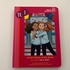 a children's book with an image of two women hugging and the title, a fair share at the diner