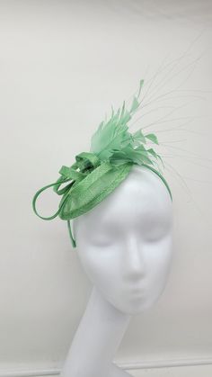 Green Wedding Fascinator. Beautiful headpiece for bridesmaids and a great accessory for a cocktail party or church outfit.  Comes with a pin or headband for an elegant but secure look. - Headband and hairclip  - Ready to ship  - Lightweight - Free Shipping - Fast shipping - Customize by adding different color flowers and or feathers Check my store for styles and colors.  Hatsandpearls.etsy.com Find more at my website: Www.hatsandpearls.com  Reach out to me if you can't find what you are looking for.  I can make cake custom orders and help you style and match your outfit  Tag and share your pictures when you wear and style our hats.  Instagram: @hats_pearls Facebook: Hats Pearls Thank you for visiting and happy shopping! Cheap Green Adjustable Costume Hats And Headpieces, Fitted Green Costume Hats And Headpieces For Wedding, Green Fitted Costume Hat For Wedding, Adjustable Pinched Crown Fascinator For Church, Green Mini Hat Headband For Kentucky Derby, Green Headband Mini Hat For Kentucky Derby, Adjustable Costume Hats With Pinched Crown For Church, Green Short Brim Headpiece For Evening, Adjustable Mini Hats With Pinched Crown For Church