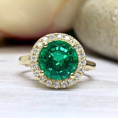 Wow picks! Round Shape Green Emerald Ring With Moissanite Halo 14K Yellow Gold, Round Emerald Engagement Ring Halo For Ladies, Birthstone Ring #7110 at $857.00 Choose your wows. 🐕 #EngagementRing #MoissaniteHalo #MayBirthstoneRing #GreenEmeraldRing #RoundCut #14kYellowGold #ForLadies #RoundShape #EngagementRings #EmeraldRing Gia Certified Green Diamond Ring, Round Cut, Green Diamond Ring With Halo Setting And Round Cut, Gia Certified Green Diamond Round Ring, Green Moissanite Diamond Ring, Round Cut, Green Moissanite Diamond Ring With Round Cut, Emerald Halo Ring With Brilliant Round Cut, Emerald Halo Ring With Brilliant Cut, Green Halo Ring With Brilliant Round Cut, Green Diamond Cluster Ring With Halo Setting