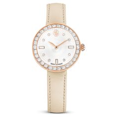 This Certa watch delivers a sublime fusion of artistry and performance. The round 30mm case is made with a beautiful rose gold-tone finish and features a bezel set with a pavé of 30 crystals. Beneath the mineral glass, a mesmerizing guilloché dial is revealed, with the Swarovski swan logo at 12 o’clock, along with indexes created from round and baguette crystals. There is also a single crystal set in the watch’s crown. For style around the wrist, the watch is presented on a quick-release Italian Modern Rose Gold Watch For Evening, Modern Rose Gold Evening Watch, Rose Gold Diamond Watch With Round Dial For Evening, Evening Rose Gold Quartz Watches, Rose Gold Leather Watches With Diamond Hour Markers, Luxury Rose Gold Watches For Evening, Rose Gold Watches For Evening With Round Dial, Evening Rose Gold Watches With Round Dial, Evening Rose Gold Watches