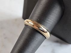 A MENS VINTAGE ESTATE 14K YELLOW GOLD WEDDING BAND RING THAT WAS MADE BY FREDERICK GOLDMAN.  RING WEIGHS 5.4g, AND IS A SIZE 9.0, AND THE WIDTH IS 3/16".   ANY  QUESTIONS PLEASE DON'T HESITATE TO ASK. THIS MAKES A GREAT GIFT FOR THAT SOMEONE SPECIAL.  BE SURE TO CHECK OUT SOME OF MY OTHER GREAT ITEMS UP FOR SALE. THANK YOU. Band Wedding Ring, Yellow Gold Wedding Band, Wedding Band Ring, Mens Vintage, Gold Wedding Band, New People, Gold Wedding, Wedding Ring Bands, Band Ring