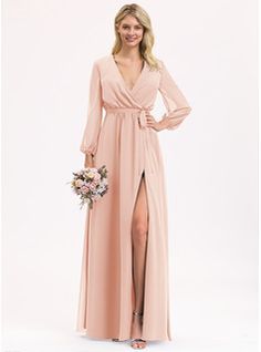 a woman wearing a long sleeved bridesmaid dress with a thigh high slit