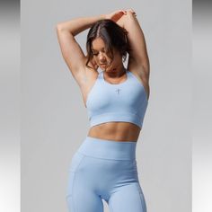 Padded Inserts That Are Removable Blue Compression Sports Bra With Built-in Bra, Blue Sports Bra With Built-in Bra For Training, Functional Blue Sports Bra With Built-in Bra, Blue Functional Sports Bra With Light Support, Blue Compressive Sports Bra With Built-in Padding, Blue Fitted Sports Bra With Light Support, Blue Stretch Sports Bra With Light Support, Blue Stretch Sports Bra With Built-in Padding, Blue High Stretch Sports Bra With Built-in Padding