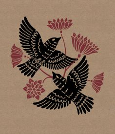 two black birds flying next to each other on a piece of brown paper with red flowers