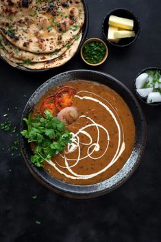 some food is sitting on a black table