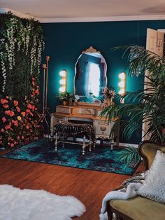 a living room filled with lots of furniture and flowers on the wall next to a mirror