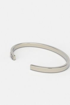 Whether you're looking for a traditional look or something newer, this cuff for men is a timeless piece of jewelry that you can wear for official events and everyday life.When choosing a men's jewel, ensure the style and material match your outfit. Choosing a comfortable men's bracelet is essential in ensuring it fits perfectly.Their exteriors and minimal shape allow the precious metal plating to shine through. You can wear them alone or with other minimal accessories with similar tones. This is the perfect piece to accessorize your wardrobe. Metal: 925 Sterling Silver / 24k Gold Plated / Rhodium over 925 Sterling Silver Dimensions: 6 mm W One Size Fits Most The cuff can open and close, is a malleable metal and carefully can adjust to your wrist. Type: Cuff 100% Handcrafted Package: High q Timeless Adjustable Cuff Bracelet With Strap, Adjustable Stainless Steel Bangle With Polished Finish, Classic Bracelet Wristband, White Gold Stainless Steel Bangle Cuff Bracelet, White Gold Stainless Steel Cuff Bangle, White Gold Stainless Steel Cuff Bracelet, Classic Adjustable Jubilee Bracelet Wristband, White Gold Stainless Steel Bangle, Classic Adjustable Jubilee Wristband