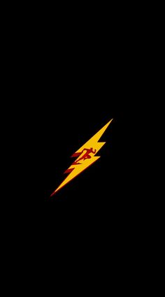 a yellow and red lightning bolt on a black background